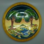 A framed Moorcroft charger, Trees, designed by Emma Bossons, 26cms