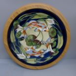 A framed Moorcroft charger of two Koi Carp, 35cm