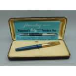 A Watermans cartridge fountain pen with rolled gold lid and 14ct gold nib