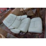 A Norweigan Ekornes beech and cream leather Stressless lounge chair and stool