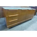 A painted teak sideboard