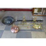 A pair of brass andirons, brass fire irons, a copper chestnut roaster and a part warming pan