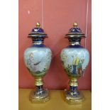 A pair of large Vienna style porcelain vases and covers