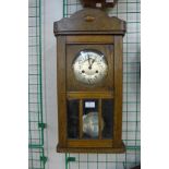 An oak wall clock