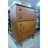 A teak chest of drawers