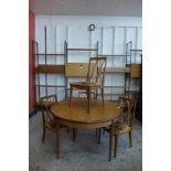 A G-Plan Fresco teak extending dining table and four chairs