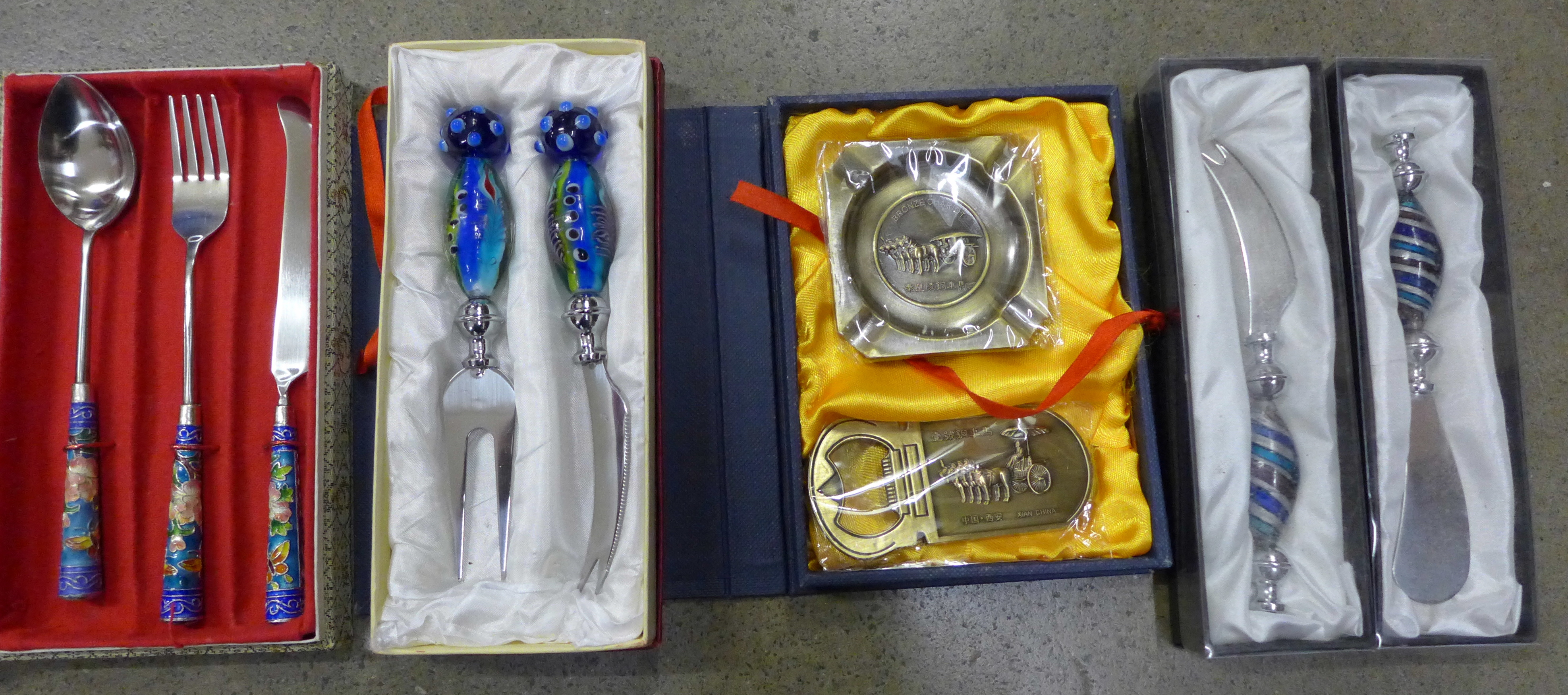 A glass handled cheese knife and butter knife, a similar set and ashtray and bottle opener ** - Image 2 of 2