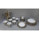 A Royal Worcester silver finish coffee set, one cup chip to rim