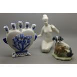 A Delft tulip vase, a Royal Dux figure and a Nao dog and cat figure