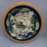 A framed Moorcroft charger of two Koi Carp, 35cm, second quality