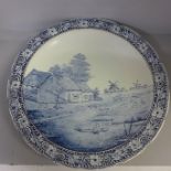 A Delftware charger marked Boch