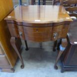 An Edward VII mahogany canteen of cutlery table