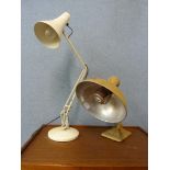 A white metal anglepoise desk lamp and a Pifco heat lamp