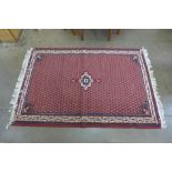 A small red ground rug