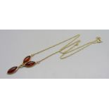 A 9ct gold and amber necklet, 4.7g