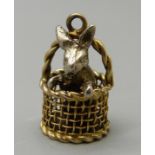 A 9ct gold basket charm with silver rabbit, 3.2g