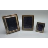 Three silver photograph frames, largest 8.5cm x 11.5cm