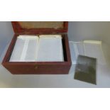 A box of 100 half plate glass plate negatives, many with named buildings