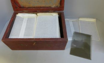 A box of 100 half plate glass plate negatives, many with named buildings