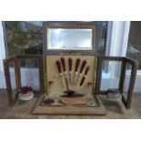 A Victorian manicure case/cabinet with contents (lacking scissors), with bevelled glass panels and
