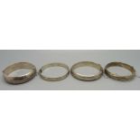 Four silver bangles, 77g