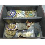 A quantity of military/regimental badges and German WWII belt buckle