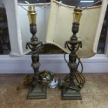 A pair of French bronze table lamps, converted