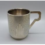 An Art Deco silver mug, Birmingham 1933, 96g, 73mm, with inscription