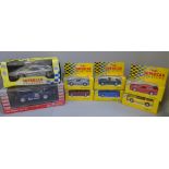A collection of model vehicles including Maisto