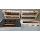 A Bachmann Southern Pacific HO gauge locomotive and five Model Power HO carriages
