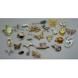 A collection of animal brooches