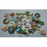 A quantity of brooches including animal themed