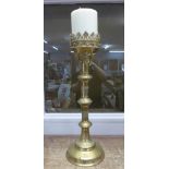 A large brass candlestick, 50cm, stem requires repair