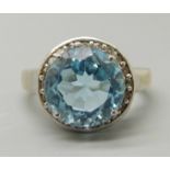 A silver and topaz ring, R