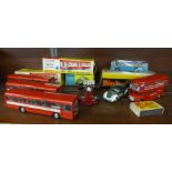 Five Dinky model buses, three boxed, a Corgi VW Police car, boxed and a Dinky racing car