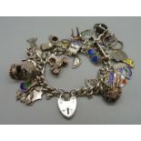 A silver charm bracelet, 77g