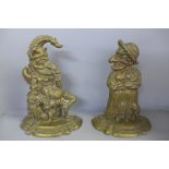 A pair of heavy brass Punch and Judy doorstops