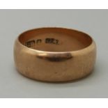 A 9ct rose gold wedding ring, Birmingham 1915, 4.3g, L