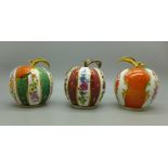 Three Royal Worcester apple candle snuffers, boxed