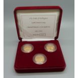A Royal Mint 2002 coin set, Channel Islands three gold proof coin set, 150th Anniversary of The Duke