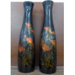 A pair of Japanese lacquered vases decorated with koi, 45.5cm