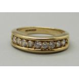 A 9ct gold, nine stone ring, 3.7g, O