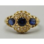 An 18ct gold, sapphire and diamond cluster ring, Birmingham 1906, 3.5g, N