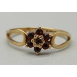 A 9ct gold and garnet flower cluster ring, 1.4g, L