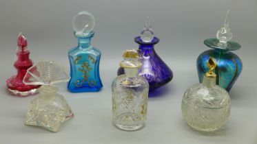 Seven glass scent bottles including one Isle of Wight