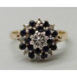 A 9ct gold, diamond and sapphire cluster ring, maker BMJ, 3.4g, Q/R