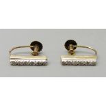 A pair of 9ct gold, rose diamond earrings with 9ct gold screw backs, each set with three diamonds