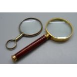 Two magnifying glasses, one old silver