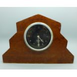 A Smiths car clock movement in a case, from a Bentley
