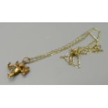 A 9ct gold Cupid charm and chain, 2.6g